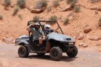 The Baltimore Ravens' Haloti Ngata shows off his guns on the Hells Revenge trail near Moab, UT.